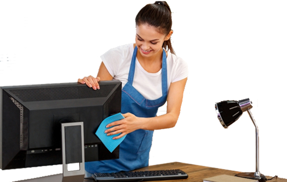Commercial cleaner dusting an office workstation in Melbourne